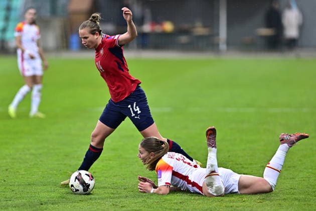 L-R Michaela Khyrova (Czechia) and Jelena Karlicic (Montenegro) in action during the European qualifying part for 2027 Women s Football World Cup match, group B1: Czechia vs Montenegro, in Chomutov, Czech Republic, on April 14, 2026. (CTKxPhoto OndrejxHajek) CTKPhotoP2026041407958  CTKPhotoP2026041407958