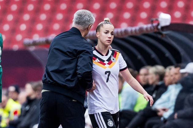 NUREMBERG, GERMANY - APRIL 14: Christian Wueck (Wück, Wuck, Head Coach Germany) hugs Giulia Gwinn (Germany, 7) after substitution during the FIFA Women™s World Cup 2027 UEFA Qualifiers match between Germany vs. Austria at Frankenstadion Max-Morlock-Stadion on April 14, 2026 in Nuremberg, Germany. Bavaria Germany Copyright: xSteffiexWunderlx