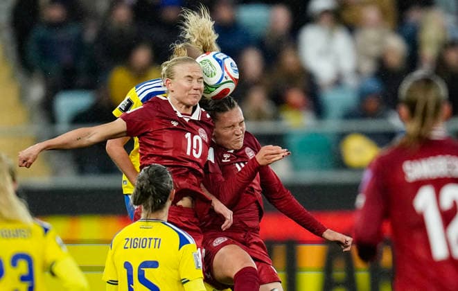 GOTHENBURG, SWEDEN 20260414 Denmark s Pernille Harder and Cecilie Floe in a head-to-head battle with Sweden s Elma Junttila Nelhage during Tuesday s soccer match in the World Cup qualifier between Sweden and Denmark at Gamla Ullevi in Gothenburg. GÖTEBORG SWEDEN x9200x