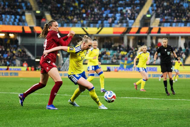 GOTHENBURG, SWEDEN 20260414 Denmark s Cecilie Floe and Sweden s Stina Blackstenius during Tuesday s World Cup qualifying soccer match between Sweden and Denmark at Gamla Ullevi in Gothenburg. GÖTEBORG SWEDEN x9200x