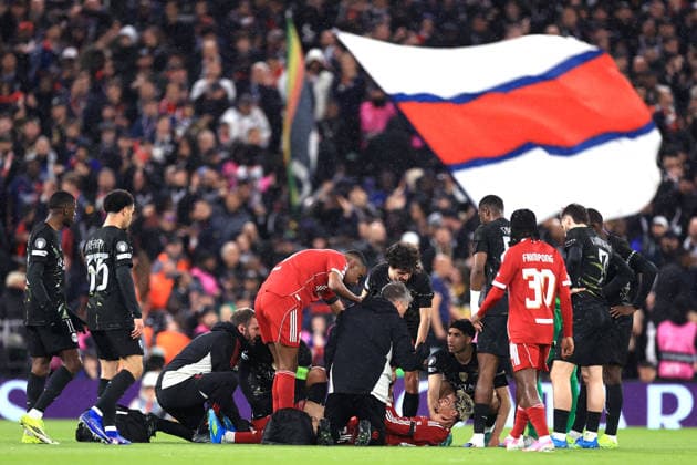 Liverpool v Paris Saint-Germain 14th April 2026 - UEFA Champions League - Quarter Final (2nd Leg) - Liverpool v Paris Saint-Germain - Hugo Ekitike of Liverpool is comforted by Achraf Hakimi of PSG after sustaining an injury - Photo: Simon Stacpoole Offside. Liverpool UK Copyright: xSimonxStacpoolexOffside
