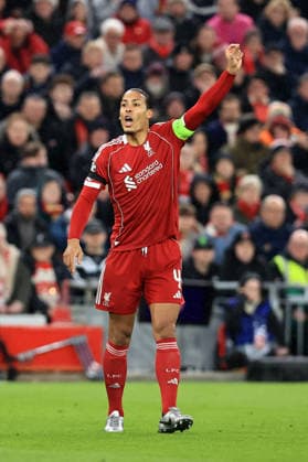 RECORD DATE NOT STATED 14th April 2026; Anfield, Liverpool, Merseyside, England; UEFA Champions League Football, Liverpool versus Paris Saint Germain; Virgil van Dijk of Liverpool directs Giorgi Mamardashvili of Liverpool DavidxBlunsden