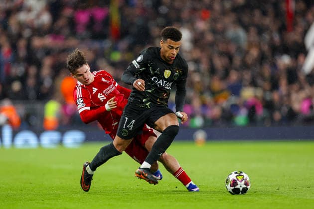 Football - UEFA Champions League - Quarter-Final - 2nd Leg - Liverpool FC v Paris Saint-Germain FC LIVERPOOL, ENGLAND - Tuesday, April 14, 2026: Liverpool s Milos Kerkez (L) challenges Paris Saint-Germain s DÃ sirÃ DouÃ during the UEFA Champions League Quarter-Final 2nd Leg match between Liverpool FC and Paris Saint-Germain FC at Anfield. (Photo by David Rawcliffe Propaganda) LIVERPOOL Anfield MERSEYSIDE ENGLAND  Copyright: xDavidxRawcliffex P2026-04-14-Liverpool_PSG-72