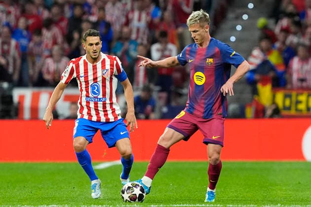 ATLETICO DE MADRID v FC Barcelona, Barca CHAMPIONS LEAGUE 2025 2026. QUARTER-FINALS 2ND LEG MATCH. Atletico de Madrid s Koke Resurreccion (l) and FC Barcelona s Dani Olmo during Champions League 2025 2026, Quarter-finals 2nd leg match. April 14 ,2026. (ALTERPHOTOS Acero) MadridSpain  Copyright: xAcerox
