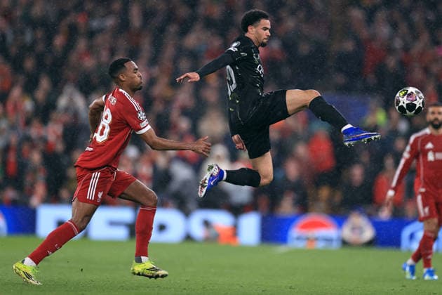 Liverpool v Paris Saint-Germain 14th April 2026 - UEFA Champions League - Quarter Final (2nd Leg) - Liverpool v Paris Saint-Germain - Warren Zaire-Emery of Paris Saint-Germain leaps to control the ball watched by Ryan Gravenberch of Liverpool - Photo: Simon Stacpoole Offside. Liverpool UK Copyright: xSimonxStacpoolexOffside
