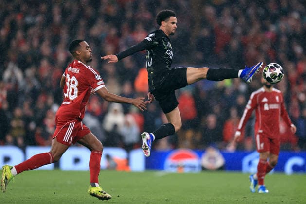 Liverpool v Paris Saint-Germain 14th April 2026 - UEFA Champions League - Quarter Final (2nd Leg) - Liverpool v Paris Saint-Germain - Warren Zaire-Emery of Paris Saint-Germain leaps to control the ball watched by Ryan Gravenberch of Liverpool - Photo: Simon Stacpoole Offside. Liverpool UK Copyright: xSimonxStacpoolexOffside