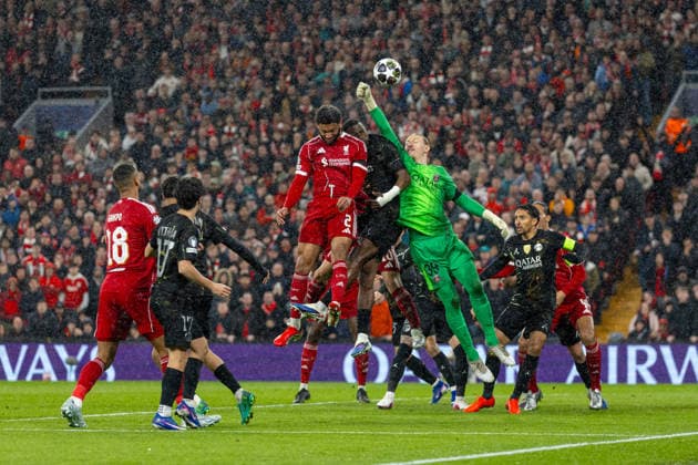 Football - UEFA Champions League - Quarter-Final - 2nd Leg - Liverpool FC v Paris Saint-Germain FC LIVERPOOL, ENGLAND - Tuesday, April 14, 2026: Liverpool s Joe Gomez heads the ball as Paris Saint-Germain s goalkeeper Matvei Safonov (R) tries to make a save during the UEFA Champions League Quarter-Final 2nd Leg match between Liverpool FC and Paris Saint-Germain FC at Anfield. (Photo by David Rawcliffe Propaganda) LIVERPOOL Anfield MERSEYSIDE ENGLAND  Copyright: xDavidxRawcliffex P2026-04-14-Liverpool_PSG-86