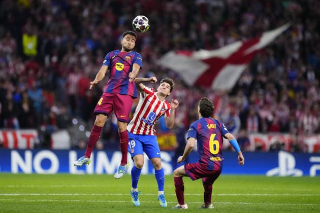 Atletico Madrid v FC Barcelona, Barca - UEFA Champions League MADRID, SPAIN - APRIL 14: Eric Garcia centre-back of Barcelona and Spain and Julian Alvarez centre-forward of Atletico de Madrid and Argentina compete for the ball during the UEFA Champions League 2025 26 Quarter-Final Second Leg match between Club Atlético de Madrid and FC Barcelona at Estadio Riyadh Air Metropolitano on April 14, 2026 in Madrid, Spain. Jose Hernandez Anadolu Madrid Spain. Editorial use only. Please get in touch for any other usage.  Copyright: x2026xAnadoluxJosexHernandezx