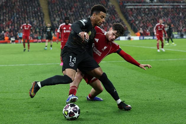 RECORD DATE NOT STATED 14th April 2026; Anfield, Liverpool, Merseyside, England; UEFA Champions League Football, Liverpool versus Paris Saint Germain; Desire Doue of Paris Saint Germain takes on Milos Kerkez of Liverpool DavidxBlunsden