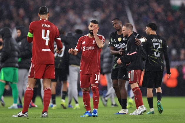 Liverpool v Paris Saint-Germain 14th April 2026 - UEFA Champions League - Quarter Final (2nd Leg) - Liverpool v Paris Saint-Germain - Virgil van Dijk and Mohamed Salah of Liverpool react to defeat at the final whistle - Photo: Simon Stacpoole Offside. Liverpool UK Copyright: xSimonxStacpoolexOffside