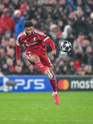 Liverpool v Paris Saint-Germain UEFA Champions League Joe Gomez of Liverpool passes the ball during the UEFA Champions League Quarter-final Second Leg match at Anfield, Liverpool 14 04 2026 UK Newspapers OUT Copyright: xKarlxVallantinex FIL-23285-0056