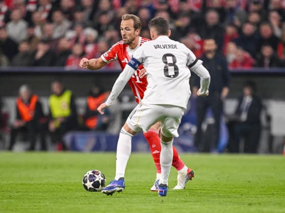 Harry Kane (FC Bayern München) and Federico Valverde (Real Madrid) battle for the ball during the UEFA Champions League 2025 26 Quarter-Final Second Leg match between FC Bayern München and Real Madrid CF at Football Arena Munich on April 15, 2026 in Munich, Germany. (Photo by Harry Langer DeFodi Images) -