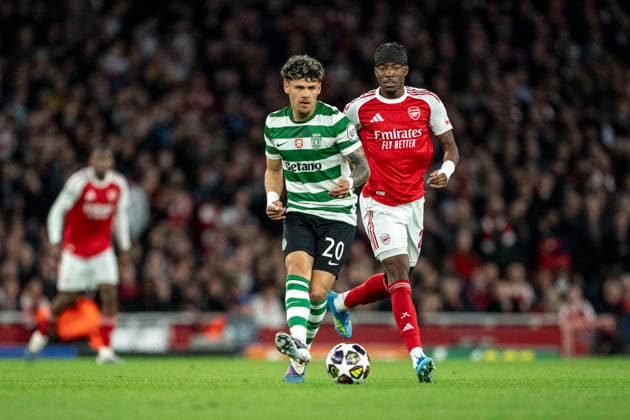 LONDON, ENGLAND - APRIL 15: Maximiliano Araujo of Sporting CP and Noni Madueke of Arsenal fight for possession during a UEFA Champions League 2025-26 match between Arsenal and Sporting CP at Emirates Stadium on April 15, 2026 in London, England. (Photo by Pedro Loureiro Sports Press Photo)  Copyright: xPedroxLoureiro SportsxPressxPhotx Sportspressphoto_SPR130407