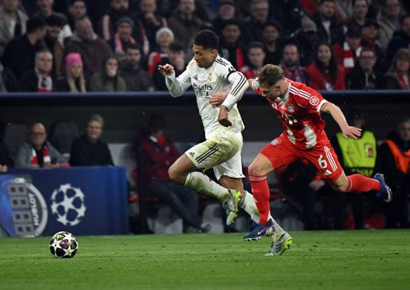 15.04.2026, xemx, Fussball UEFA Champions League, FC Bayern Muenchen - Real Madrid v.l. Jude Bellingham (Real Madrid), Joshua Kimmich (FC Bayern Muenchen) (DFL DFB REGULATIONS PROHIBIT ANY USE OF PHOTOGRAPHS as IMAGE SEQUENCES and or QUASI-VIDEO) Muenchen