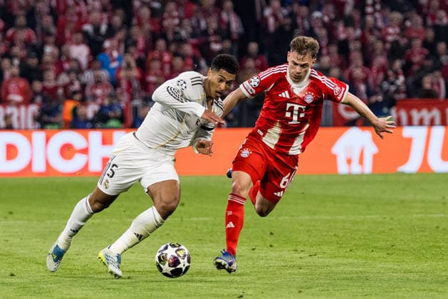 MUNICH, GERMANY - APRIL 15: Jude Bellingham (Real Madrid, 5) controls the ball against Joshua Kimmich (FC Bayern Muenchen, 6) during the UEFA Champions League match between FC Bayern Muenchen vs. Real Madrid at Allianz Arena on the second leg of quarter finals of the UEFA Champions League on April 15, 2026 in Munich, Germany. Bavaria Germany Copyright: xSteffiexWunderlx