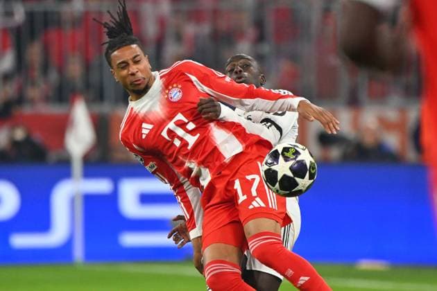 Michael OLISE (Bayern Muenchen), Aktion,Zweikampf gegen Ferland MENDI (Real Madrid). nach Tor zum 2-3,Jubel,Freude,Begeisterung, Aktion. Fussball Champions League,Saison 2025 26, Viertelfinale FC Bayern-Muenchen -Real Madrid am 15.04.2026 A L L I A N Z A R E N A.