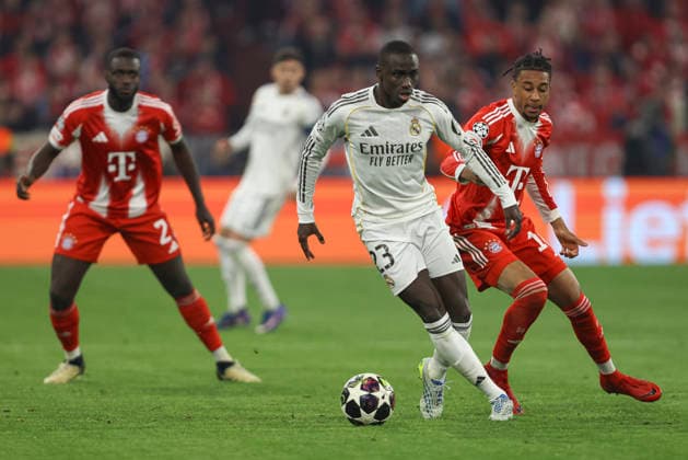 Ferland Mendy (Real Madrid C.F.) und Joshua Kimmich (FC Bayern München) battle for the ball during the UEFA Champions League 2025 26 Quarter-Final Second Leg match between FC Bayern München and Real Madrid CF at Football Arena Munich on April 15, 2026 in Munich, Germany. (Photo by Oliver Kaelke DeFodi Images) -