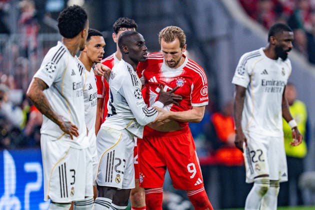 15.04.2026, FC Bayern München vs. Real Madrid, UEFA Champions League, Viertelfinale-Rückspiel Harry Kane (FC Bayern Muenchen, 9) Ferland Mendy (Real Madrid, 23) Regulations prohibit any use of photographs as image sequences and or quasi video Copyright: xBahhoxKarax