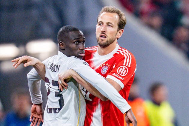 15.04.2026, FC Bayern München vs. Real Madrid, UEFA Champions League, Viertelfinale-Rückspiel Harry Kane (FC Bayern Muenchen, 9) Ferland Mendy (Real Madrid, 23) Regulations prohibit any use of photographs as image sequences and or quasi video Copyright: xBahhoxKarax