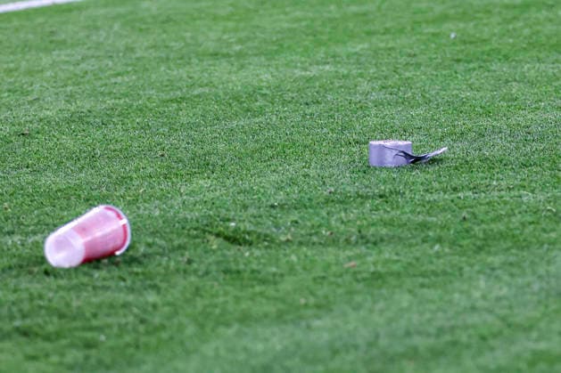 Plastic cap and tape thrown to Kylian Mbappe after scoring a goal during UEFA Champions League quarterfinal game between teams of FC Bayern Munich and Real Madrid CF at Allianz Arena Germany (Grzegorz Wajda Ball Raw Images) Munich Allianz Arena Germany Copyright: xGrzegorzxWajdax grzegorzwajda_uclquarterfinalbayernreal2526__168