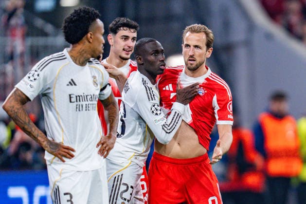 15.04.2026, FC Bayern München vs. Real Madrid, UEFA Champions League, Viertelfinale-Rückspiel Harry Kane (FC Bayern Muenchen, 9) Ferland Mendy (Real Madrid, 23) Regulations prohibit any use of photographs as image sequences and or quasi video Copyright: xBahhoxKarax