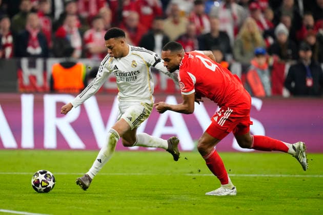 FC Bayern München v Real Madrid CF - UEFA Champions League 2025 26 Quarter-Final Second Leg Kylian Mbappe centre-forward of Real Madrid and France and Jonathan Tah centre-back of Bayern Munchen and Germany compete for the ball during the UEFA Champions League 2025 26 Quarter-Final Second Leg match between FC Bayern München and Real Madrid CF at Football Arena Munich on April 15, 2026 in Munich, Germany. Munich Germany  Copyright: xJosexBretonx originalFilename:bretonhernandez-fcbayern260415_npCj5.jpg