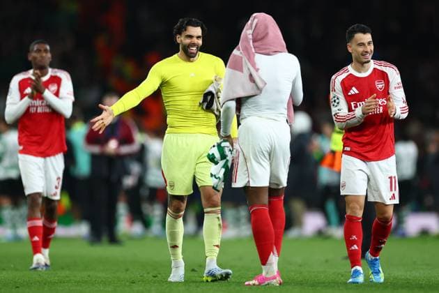 David Raya of Arsenal with Eberechi Eze of Arsenal and Gabriel Martinelli of Arsenal at full time Arsenal v Sporting, UEFA Champions League, Quarter Final, Second Leg, Football, Emirates Stadium, London, UK - 15 Apr 2026London Emirates Stadium United Kingdom EDITORIAL USE ONLY No use with unauthorised audio, video, data, fixture lists, club league logos or live services. Online in-match use limited to 120 images, no video emulation. No use in betting, games or single club league player publications. Copyright: xSimonxDael Shutterstockx 16828544bs