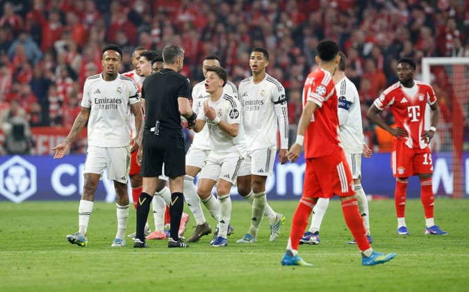 15.04.2026, xjrdrx, Fussball UEFA Champions League, FC Bayern Muenchen - Real Madrid v.l. Schiedsrichter Referee Slavko Vincic (Slowenien), Arda Güler (Real Madrid) (DFL DFB REGULATIONS PROHIBIT ANY USE OF PHOTOGRAPHS as IMAGE SEQUENCES and or QUASI-VIDEO) Muenchen