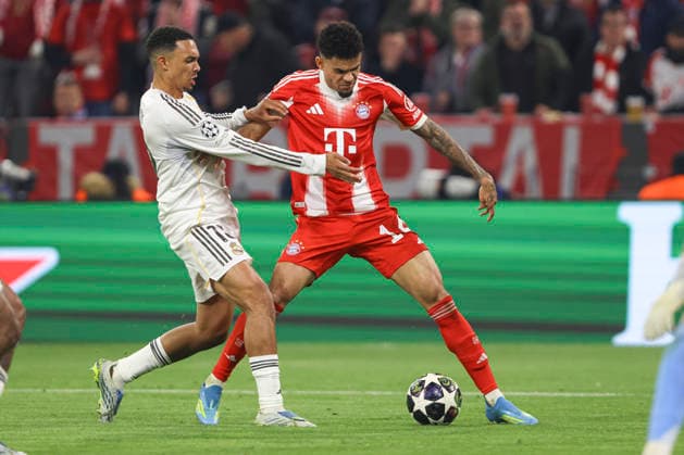 Trent John Alexander-Arnold (Real Madrid C.F.) und Luis Diaz (FC Bayern München) battle for the ball during the UEFA Champions League 2025 26 Quarter-Final Second Leg match between FC Bayern München and Real Madrid CF at Football Arena Munich on April 15, 2026 in Munich, Germany. (Photo by Oliver Kaelke DeFodi Images) -