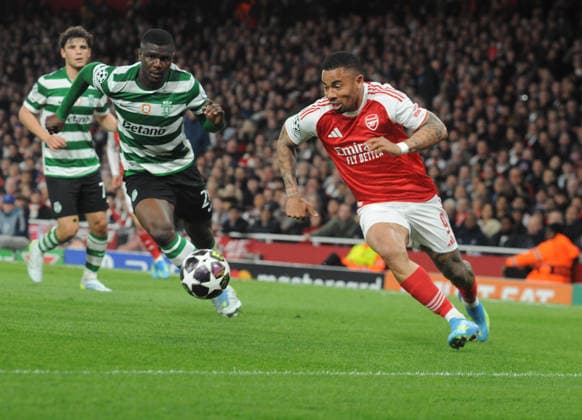 Football - 2025 2026 UEFA Champions League - Quarter-Final, Second Leg: Arsenal (1) vs. Sporting Lisbon (0) - Emirates Stadium - Wednesday 15th April 2026 Gabriel Jesus of Arsenal and Ousmane Diomande of Sporting Lisbon 