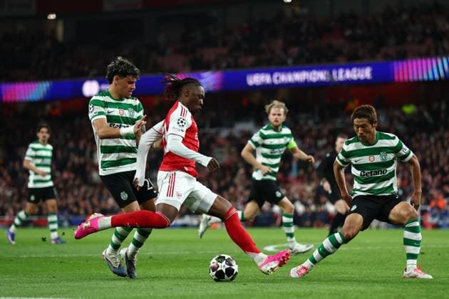 Eberechi Eze of Arsenal with a shot on goal under pressure from Maximiliano Araujo of Sporting CP and Hidemasa Morita of Sporting CP Arsenal v Sporting, UEFA Champions League, Quarter Final, Second Leg, Football, Emirates Stadium, London, UK - 15 Apr 2026London Emirates Stadium United Kingdom EDITORIAL USE ONLY No use with unauthorised audio, video, data, fixture lists, club league logos or live services. Online in-match use limited to 120 images, no video emulation. No use in betting, games or single club league player publications. Copyright: xSimonxDael Shutterstockx 16828544cu