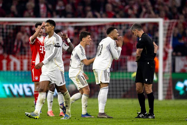 Arda Guler AND Kylian Mbappe AND Referee Slavko Vincic seen during UEFA Champions League quarterfinal game between teams of FC Bayern Munich and Real Madrid CF at Allianz Arena Germany (Grzegorz Wajda Ball Raw Images) Munich Allianz Arena Germany Copyright: xGrzegorzxWajdax grzegorzwajda_uclquarterfinalbayernreal2526__506