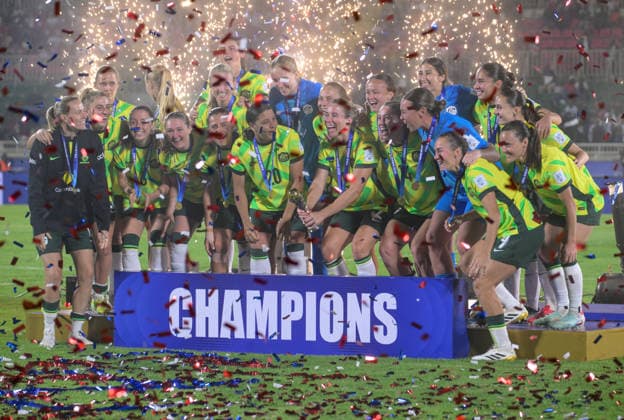 (260416) -- NAIROBI, April 16, 2026 -- The Australian team celebrates their victory on the podium after the FIFA Women s Series 2026 final football match between Australia and Kenya at Nyayo National Stadium in Nairobi, Kenya, on April 15, 2026. ) (SP)KENYA-NAIROBI-FOOTBALL-FIFA SERIES-AUSTRALIA VS KENYA YangxGuang 