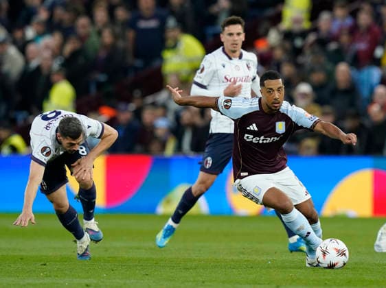 Birmingham, England, 16th April 2026. Bologna s Remo Freuler (l) and Youri Tielemans of Aston Villa (r) during the Aston Villa vs Bologna UEFA Europa League quarter final 2nd leg match at Villa Park, Birmingham. Picture credit should read: Andrew Yates Sportimage EDITORIAL USE ONLY. No use with unauthorised audio, video, data, fixture lists, club league logos or live services. Online in-match use limited to 120 images, no video emulation. No use in betting, games or single club league player publications. SPI_026_AY_Villa_Bologna SPI-4689-0027