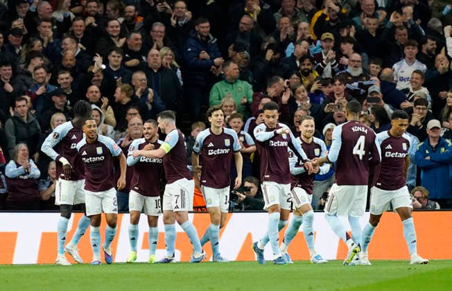 Birmingham, England, 16th April 2026. Emiliano Buendia of Aston Villa (3l) celebrates scoring their second goal during the Aston Villa vs Bologna UEFA Europa League quarter final 2nd leg match at Villa Park, Birmingham. Picture credit should read: Andrew Yates Sportimage EDITORIAL USE ONLY. No use with unauthorised audio, video, data, fixture lists, club league logos or live services. Online in-match use limited to 120 images, no video emulation. No use in betting, games or single club league player publications. SPI_039_AY_Villa_Bologna SPI-4689-0038