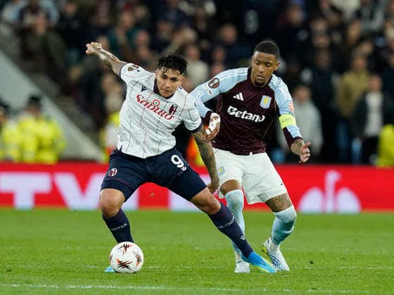 Birmingham, England, 16th April 2026. Bologna s Santiago Castro tussles with Ezri Konsa of Aston Villa during the Aston Villa vs Bologna UEFA Europa League quarter final 2nd leg match at Villa Park, Birmingham. Picture credit should read: Andrew Yates Sportimage EDITORIAL USE ONLY. No use with unauthorised audio, video, data, fixture lists, club league logos or live services. Online in-match use limited to 120 images, no video emulation. No use in betting, games or single club league player publications. SPI_050_AY_Villa_Bologna SPI-4689-0050