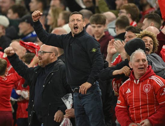 Nottingham, England, 16th April 2026. Nottingham Forest fans celebrate during the Nottingham Forest vs FC Porto UEFA Europa League quarter final 2nd leg match at the City Ground, Nottingham. Picture credit should read: Harriet Massey Sportimage EDITORIAL USE ONLY. No use with unauthorised audio, video, data, fixture lists, club league logos or live services. Online in-match use limited to 120 images, no video emulation. No use in betting, games or single club league player publications. SPI_046_FOREST_V_PORTO SPI-4690-0050
