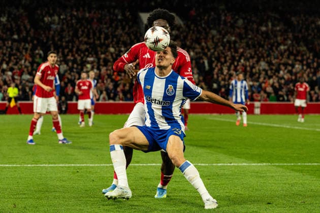 RECORD DATE NOT STATED 16th April 2026; The City Ground, Nottingham, England; UEFA Europa League Football, Nottingham Forest versus Porto; Francisco Moura of FC Porto holds off Ola Aina of Nottingham Forest GodfreyxPitt