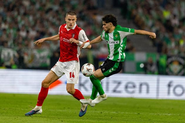 Gustaf Lagerbielke (14) and Abde Ezzalzouli (10) seen during UEFA Europa League quarterfinal game between teams of Real Betis Balompie and SC Braga (Maciej Rogowski Ball Raw Images) Sevilla Estadio La Cartuja Spain Copyright: xMaciejxRogowskix ROG_RBvBRA-096