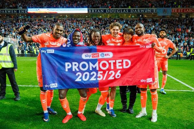 Coventry City celebrate promotion with a skybet branded promoted banner. Blackburn Rovers v Coventry City, Sky Bet Championship, Football, Ewood Park, Blackburn, UK - 17 Apr 2026Blackburn Ewood Park United Kingdom EDITORIAL USE ONLY No use with unauthorised audio, video, data, fixture lists, club league logos or live services. Online in-match use limited to 120 images, no video emulation. No use in betting, games or single club league player publications.  Copyright: xRyanxBrowne Shutterstockx 16832010hf