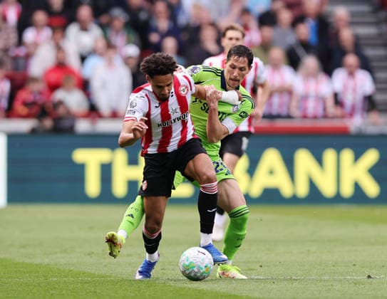 London, England, 18th April 2026. Kevin Schade of Brentford with Sasa Lukic of Fulham during the Brentford vs Fulham Premier League match at Gtech Community Stadium, London. Picture credit should read: David Klein Sportimage EDITORIAL USE ONLY. No use with unauthorised audio, video, data, fixture lists, club league logos or live services. Online in-match use limited to 120 images, no video emulation. No use in betting, games or single club league player publications. SPI_DK_010_Brentford_Fulham SPI-4698-0010