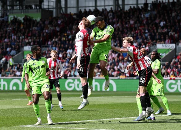 London, England, 18th April 2026. Sepp van den Berg of Brentford with Rodrigo Muniz of Fulham during the Brentford vs Fulham Premier League match at Gtech Community Stadium, London. Picture credit should read: David Klein Sportimage EDITORIAL USE ONLY. No use with unauthorised audio, video, data, fixture lists, club league logos or live services. Online in-match use limited to 120 images, no video emulation. No use in betting, games or single club league player publications. SPI_DK_013_Brentford_Fulham SPI-4698-0013