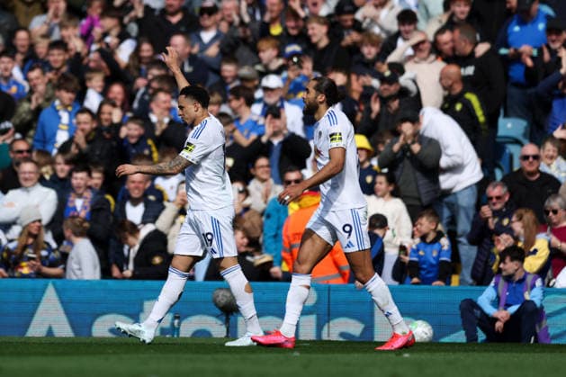 Leeds, England, 18th April 2026. Noah Okafor of Leeds United celebrates scoring his team™s second goal with teammates during the Leeds United vs Wolverhampton Wanderers Premier League match at Elland Road, Leeds. Picture credit should read: Jessica Hornby Sportimage EDITORIAL USE ONLY. No use with unauthorised audio, video, data, fixture lists, club league logos or live services. Online in-match use limited to 120 images, no video emulation. No use in betting, games or single club league player publications. SPI_031_JH_LEEDS_UNITED_WOLVES SPI-4700-0031