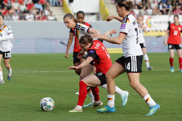 18.04.2026, xgrfx, Fussball WM Qualifikation Frauen, Österreich - Deutschland v.l. Jule Brand (Deutsche Frauennationalmannschaft), Chiara Dangelo (Österreich) (DFL DFB REGULATIONS PROHIBIT ANY USE OF PHOTOGRAPHS as IMAGE SEQUENCES and or QUASI-VIDEO) Ried