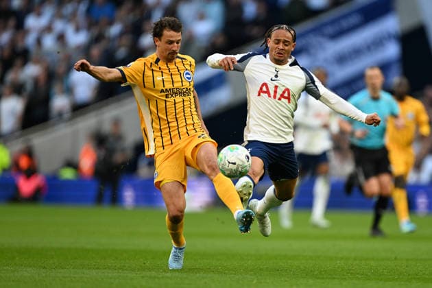 Tottenham Hotspur v Brighton and Hove Albion, Premier League Brighton & Hove Albion defender Olivier Boscagli (21) and Tottenham Hotspur midfielder Xavi Simons (7) during the Premier League match between Tottenham Hotspur and Brighton and Hove Albion at Tottenham Hotspur Stadium, London, UK on 18 April 2026. London Tottenham Hotspur Stadium London UK Editorial use only DataCo restrictions apply See www.football-dataco.com , Copyright: xSimonxTraylenx PSI-24094-0029
