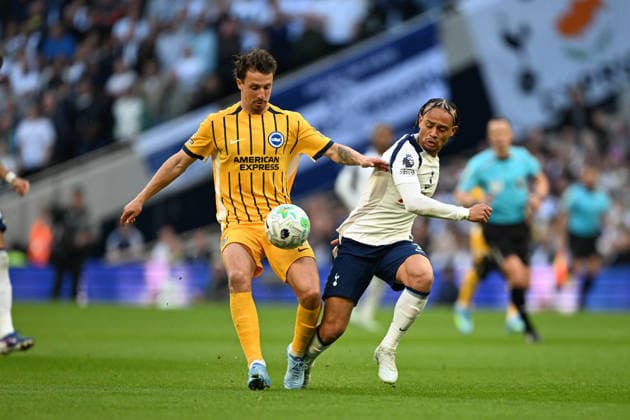 Tottenham Hotspur v Brighton and Hove Albion, Premier League Brighton & Hove Albion defender Olivier Boscagli (21) and Tottenham Hotspur midfielder Xavi Simons (7) during the Premier League match between Tottenham Hotspur and Brighton and Hove Albion at Tottenham Hotspur Stadium, London, UK on 18 April 2026. London Tottenham Hotspur Stadium London UK Editorial use only DataCo restrictions apply See www.football-dataco.com , Copyright: xSimonxTraylenx PSI-24094-0031