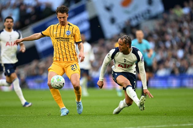 Tottenham Hotspur v Brighton and Hove Albion, Premier League Brighton & Hove Albion defender Olivier Boscagli (21) and Tottenham Hotspur midfielder Xavi Simons (7) during the Premier League match between Tottenham Hotspur and Brighton and Hove Albion at Tottenham Hotspur Stadium, London, UK on 18 April 2026. London Tottenham Hotspur Stadium London UK Editorial use only DataCo restrictions apply See www.football-dataco.com , Copyright: xSimonxTraylenx PSI-24094-0032