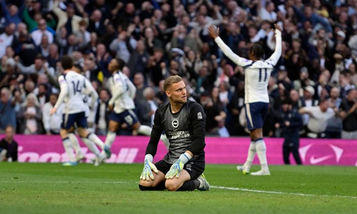 Tottenham Hotspur V Brighton and Hove Albion. Premier League Goal. As the Spurs players celebrate Bart Verbruggen (Brighton, goalkeeper) looks dejected during the Tottenham Hotspur V Brighton and Hove Albion Premier League match at the Tottenham Hotspur Stadium, London. Tottenham Tottenham Hotspur Stadium UK Copyright: xMartinxDaltonx Spurs_Brighton_180426_MD_065