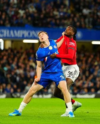 Liam Delap of Chelsea grapples with with Ayden Heaven of Manchester United, ManU Chelsea v Manchester United, Premier League, Football, Stamford Bridge, London, UK - 18 Apr 2026London Stamford Bridge United Kingdom EDITORIAL USE ONLY No use with unauthorised audio, video, data, fixture lists, club league logos or live services. Online in-match use limited to 120 images, no video emulation. No use in betting, games or single club league player publications. Copyright: xJavierxGarcia Shutterstockx 16832178aq