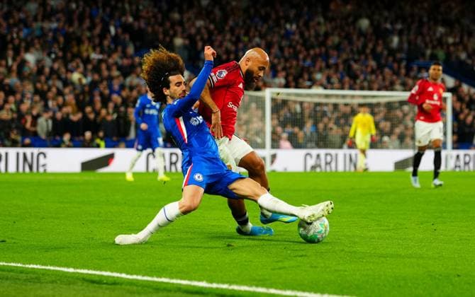 Marc Cucurella of Chelsea tackles Bryan Mbeumo of Manchester United, ManU Chelsea v Manchester United, Premier League, Football, Stamford Bridge, London, UK - 18 Apr 2026London Stamford Bridge United Kingdom EDITORIAL USE ONLY No use with unauthorised audio, video, data, fixture lists, club league logos or live services. Online in-match use limited to 120 images, no video emulation. No use in betting, games or single club league player publications.  Copyright: xJavierxGarcia Shutterstockx 16832178av